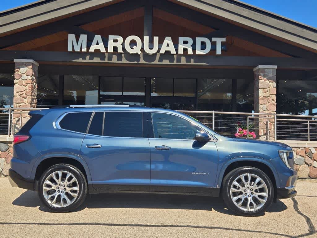 2025 GMC Acadia Denali in Downpour Metallic — front three-quarter view