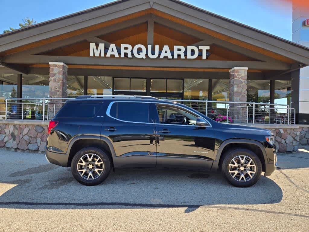 2021 GMC Acadia SLE in Ebony Twilight Metallic — front three-quarter view
