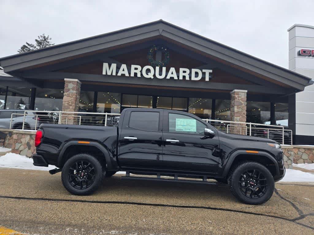 2026 GMC Canyon Denali in Onyx Black — front three-quarter view
